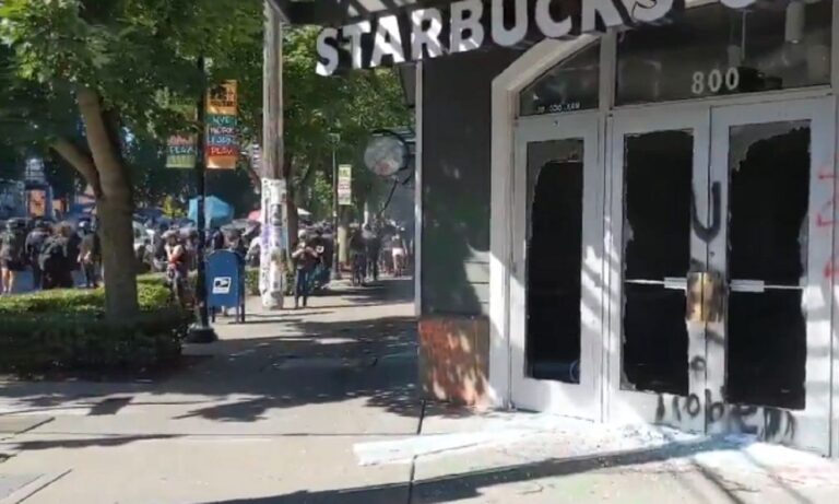 seattle mob burns Starbucks with residents living above it